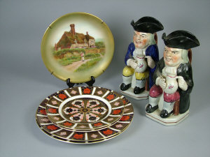 A Royal Crown Derby imari pattern plate 27 cm diameter