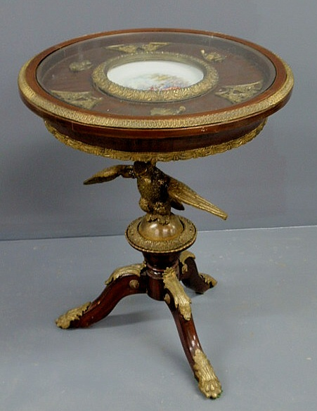 French style mahogany end table with a glass topped inset