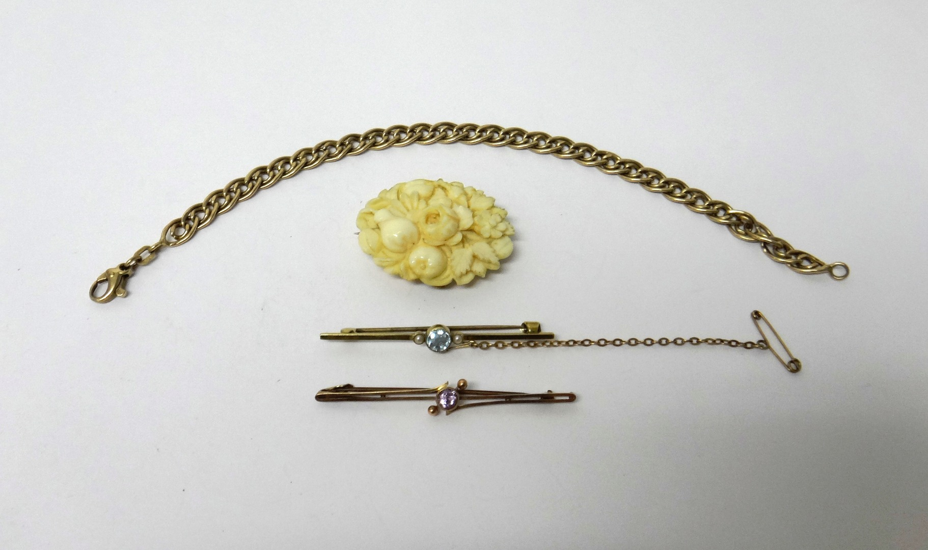A 9ct gold multiple link bracelet on a sprung hook