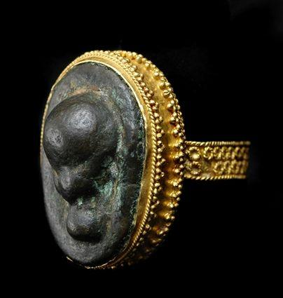 Persian Glass Set in a Granulated Gold Ring