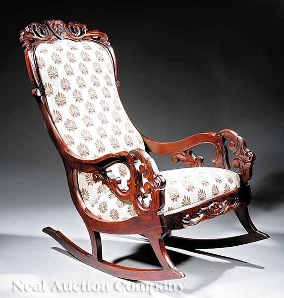 An American Rococo Carved Walnut Lincoln Rocker mid 19th c