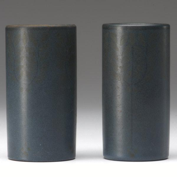 MARBLEHEAD Pair of cylindrical bud vases each decorated with a