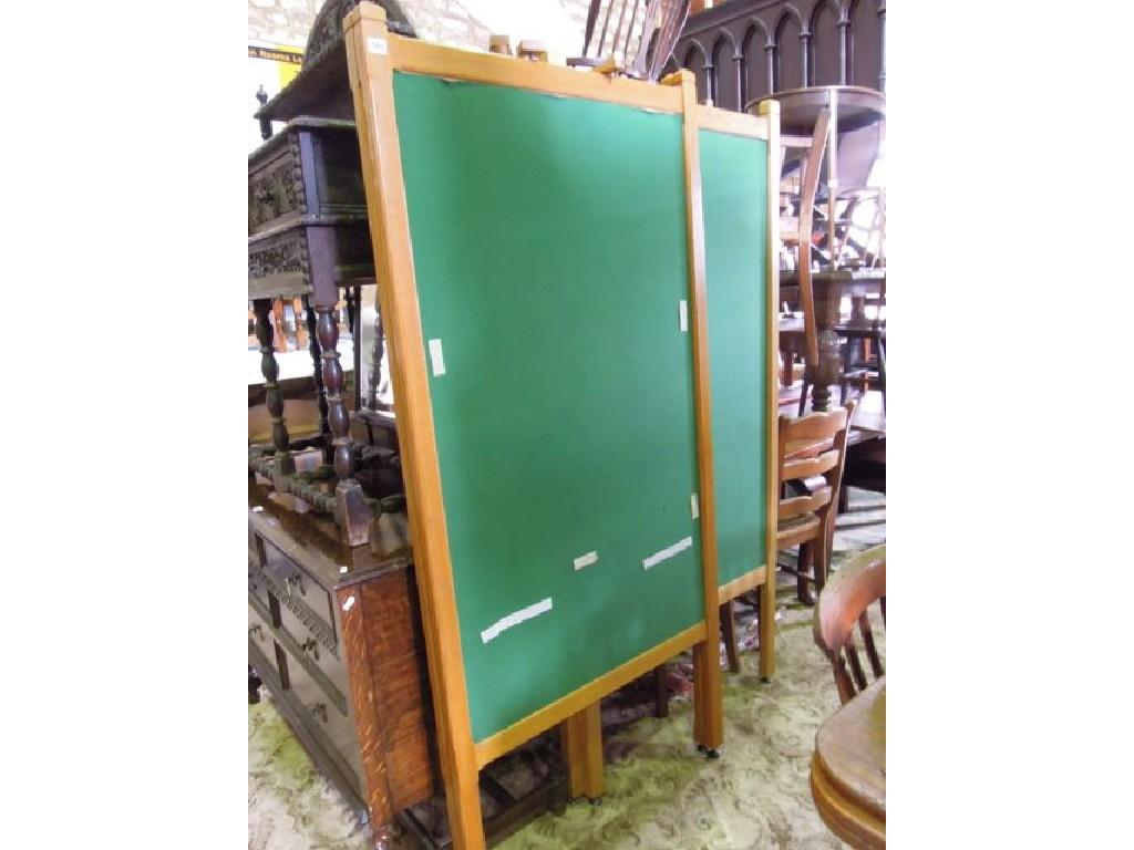 A pair of good quality craftsman made light oak freestanding