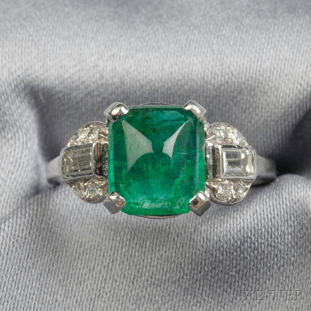 Platinum Emerald and Diamond Ring prong set with a sugarloaf