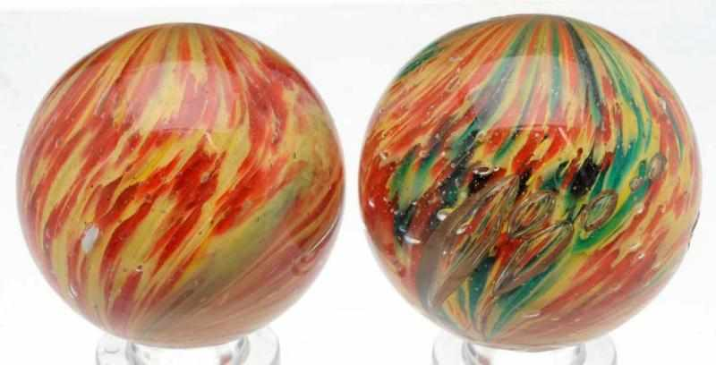 Lot of 2 Onionskin Marbles Includes one marble with yellow