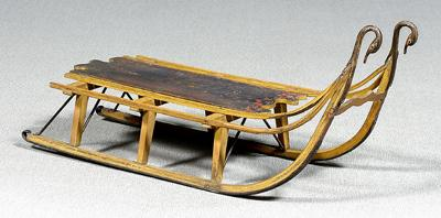 Painted wood and iron gooseneck sled iron mounts with gooseneck