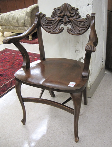 LATE VICTORIAN CARVED MAHOGANY ARMCHAIR American c 1900 the low