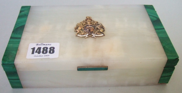 A silver gilt mounted onyx and malachite cigarette box mark