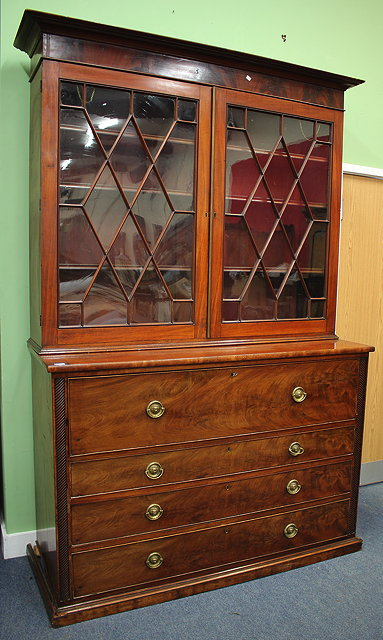 AN EARLY 19TH CENTURY MAHOGANY SECRETAIRE BOOKCASE the upper section