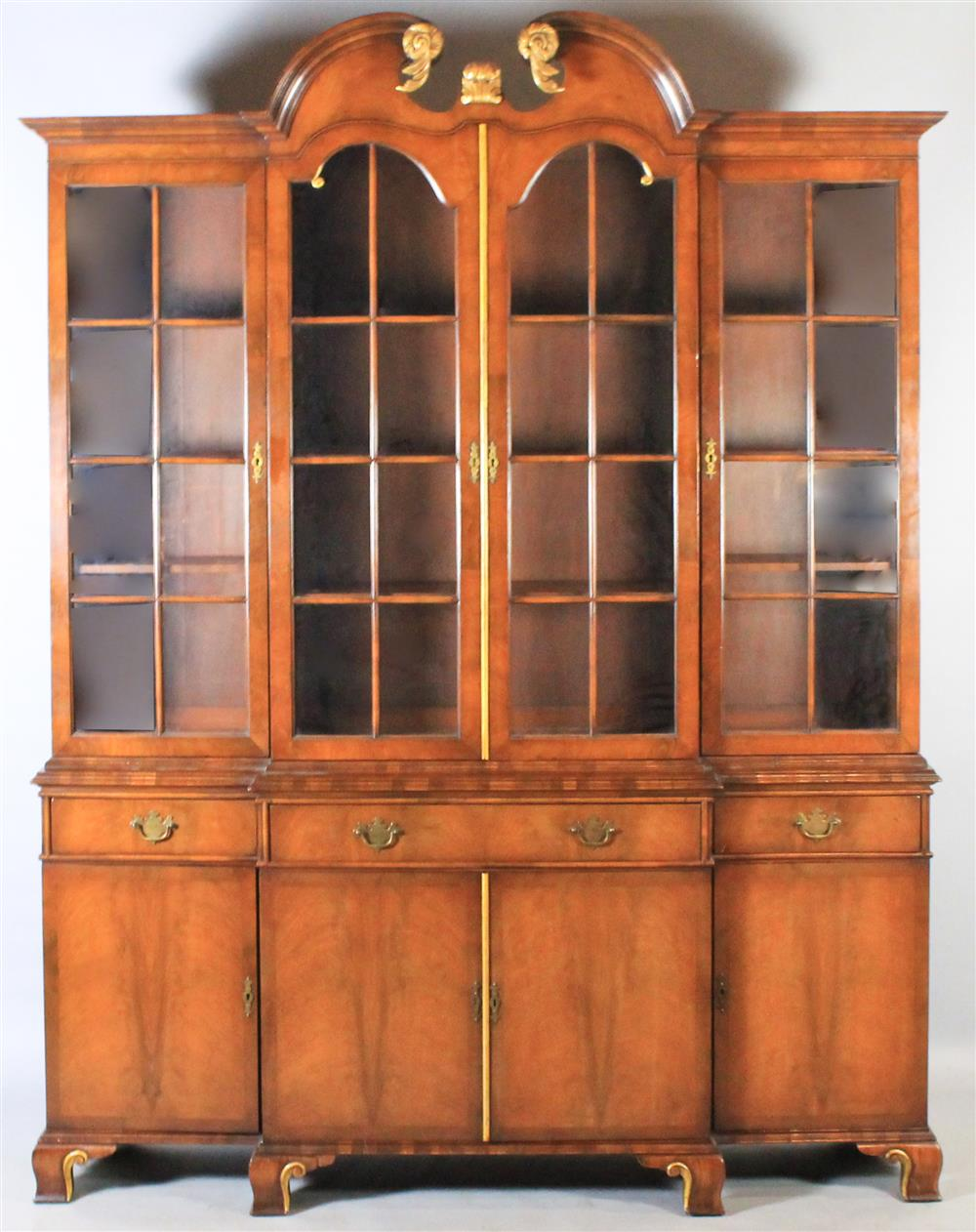 WOOD AND HOGAN GEORGIAN STYLE GILDED AND CARVED WALNUT BREAKFRONT