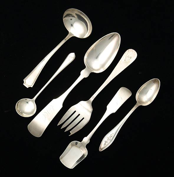 A group of silver flatware Comprising coin Fiddle tablespoon monogrammed