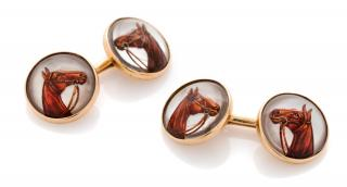 A Pair of Yellow Gold and Reverse Crystal Horse Cufflinks