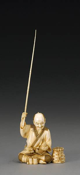 A group of three tinted ivory okimono The first a