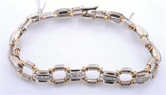 A DIAMOND BRACELET Comprising fancy open octagonal links with rectangular