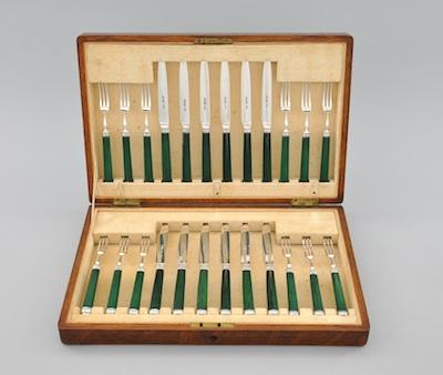 A Set of Sterling Silver Fruit Knives and Forks for