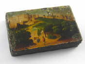 A 19th century toleware tobacco box hand painted with a
