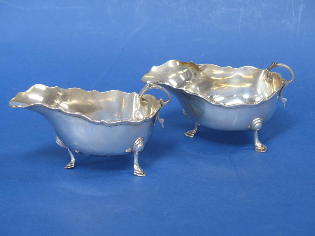 A MATCHED PAIR OF SAUCE BOATS of oval form with