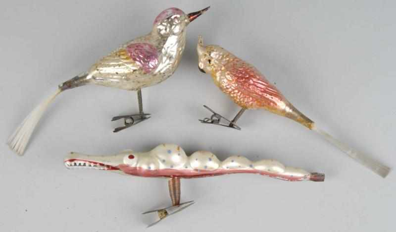 Lot of 3 Glass Figural Christmas Ornaments Description Includes one
