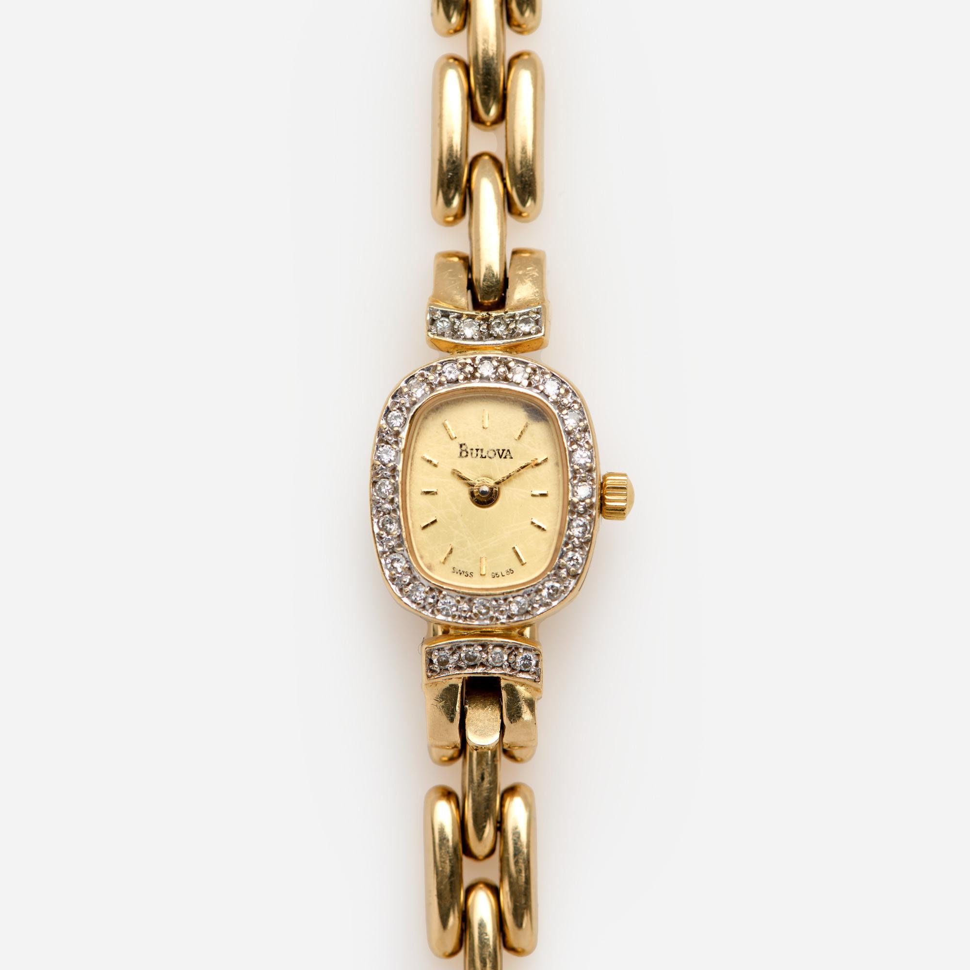 14K DIAMOND BULOVA LADIES WATCH A 14k yellow gold Bulova