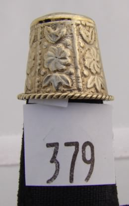 Thimble with floral design and rope band rim