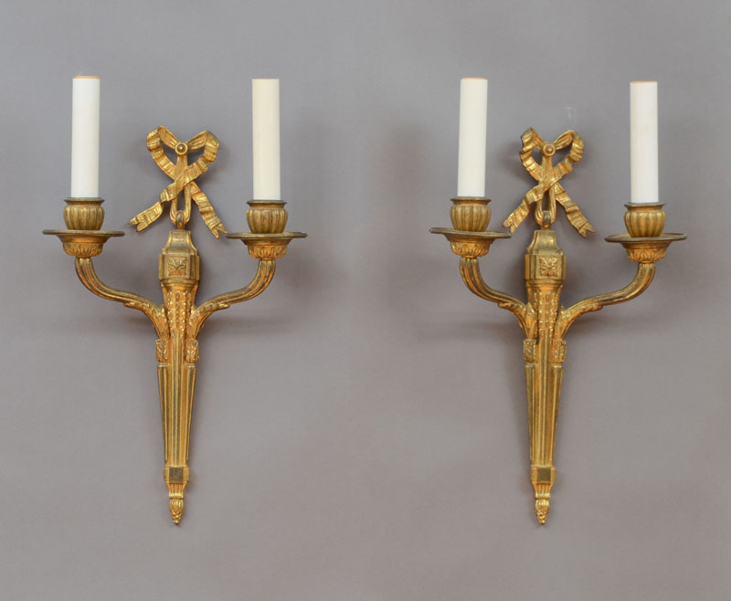 SET OF FOUR LOUIS XVI STYLE GILT BRONZE TWO LIGHT