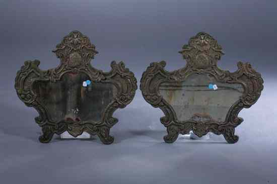 PAIR CONTINENTAL BRASS REPOUSSE CARTOUCHE SHAPE WALL MIRRORS late 18th