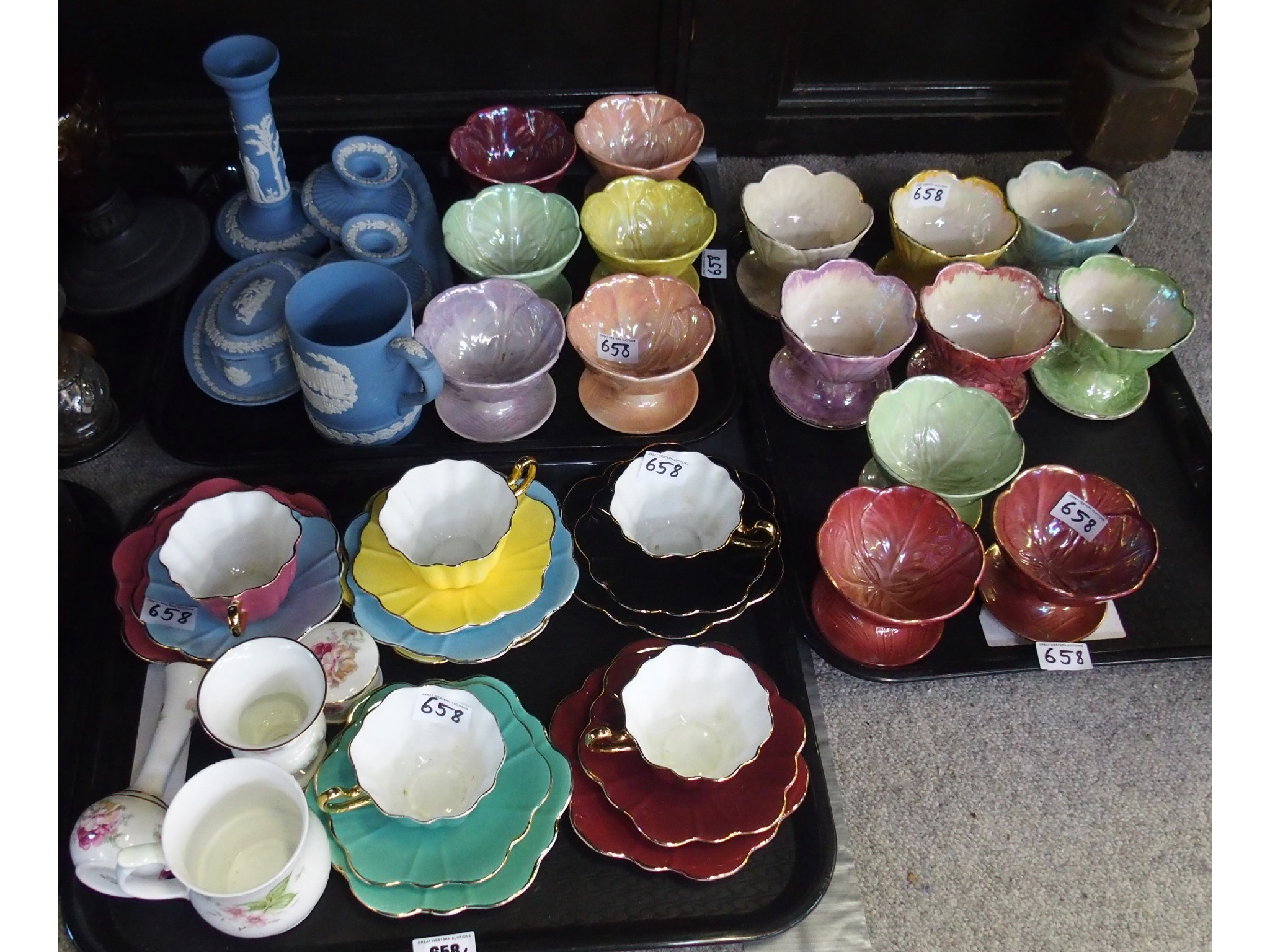 Three trays comprising five Royal Stuart flori form tea trios