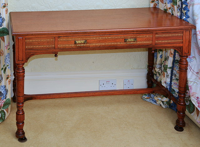 A VICTORIAN WALNUT SIDE TABLE with parquetry banded decoration to