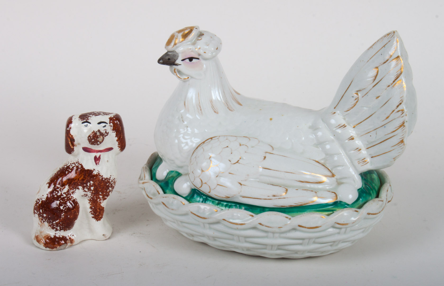 Staffordshire earthenware hen on nest spaniel late 19th 20 century