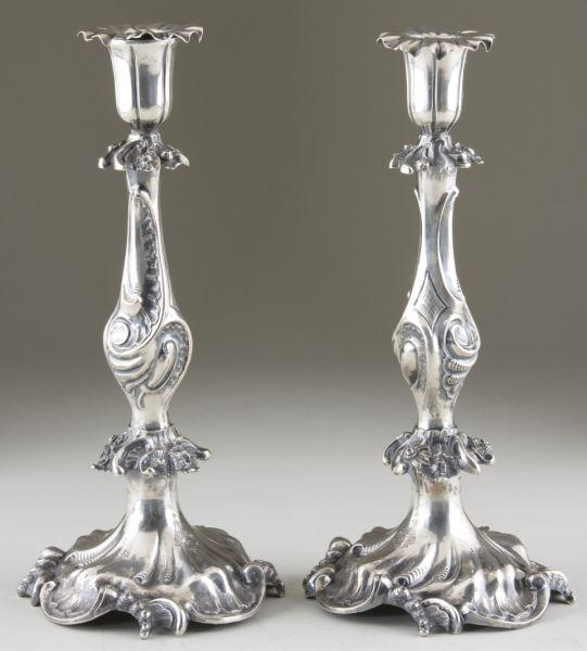 Pair of Silver Candlesticks circa 1863 both in an ornate