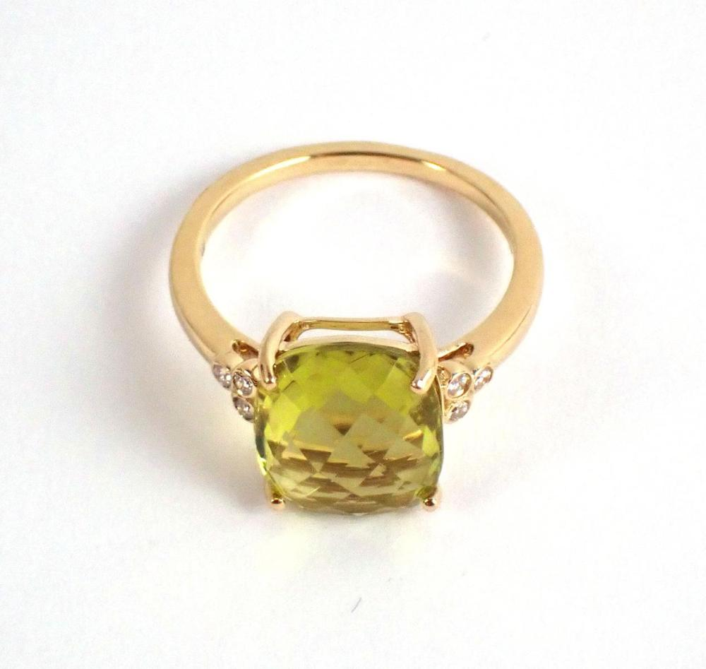 LEMON CITRINE DIAMOND AND FOURTEEN KARAT GOLD RING with three