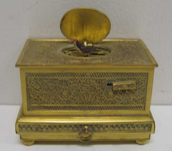 GERMAN GILT BRONZE AUTOMATON MUSIC BOX Trunk form with bottom