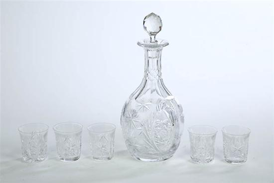 CUT GLASS DECANTER SET The decanter has finely cut decoration