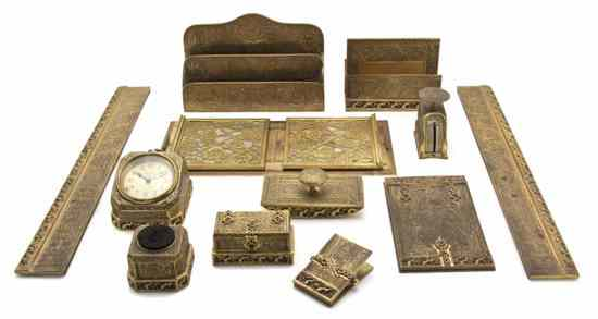 An Assembled Tiffany Studios Bronze Desk Set comprising blotter ends