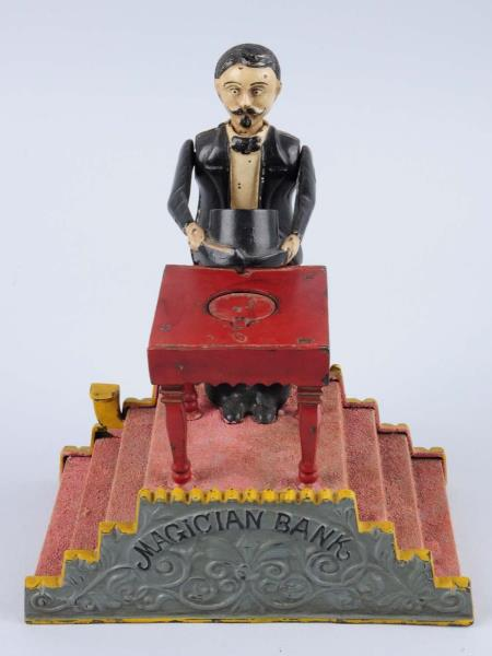 Magician Mechanical Bank Manufactured by J E Stevens Co This