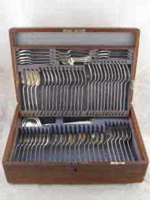 A silver Albany pattern canteen in original oak case comprising