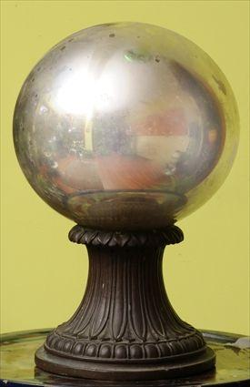 MERCURY GLASS GAZING BALL ON STAND The patinated composition stand