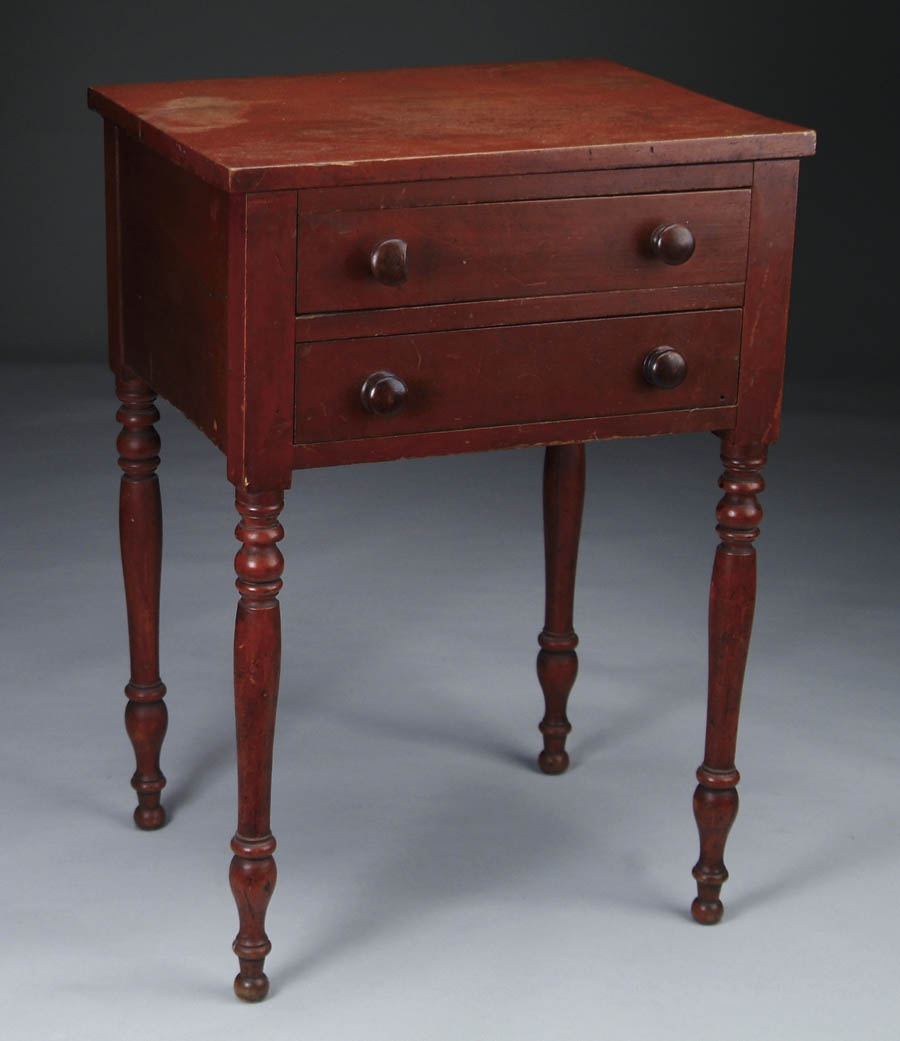 TWO DRAWER SHERATON STAND IN RED WASH In what appears