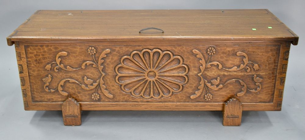 Cedar lined lift top chest with carved front ht 22