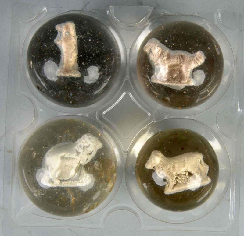 Lot of 4 Sulphide Marbles Description Includes one lion one