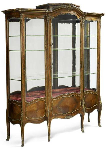 A late 19th century kingwood vitrine In the Louis XV