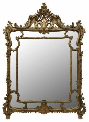 Large Italian Louis XV style giltwood mirror 20th c having