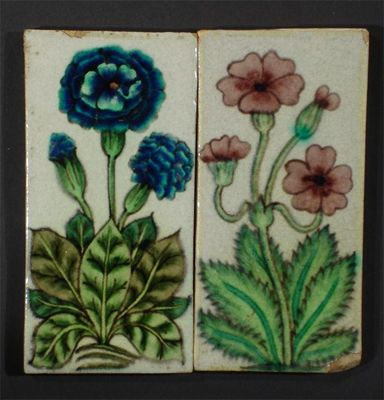 A pair of William De Morgan tiles one decorated with