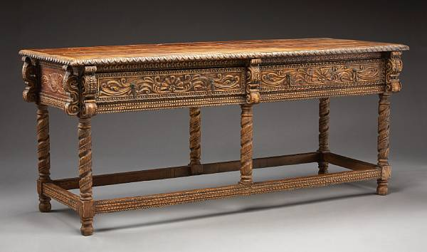 A Portuguese Baroque style mixed wood library console table The