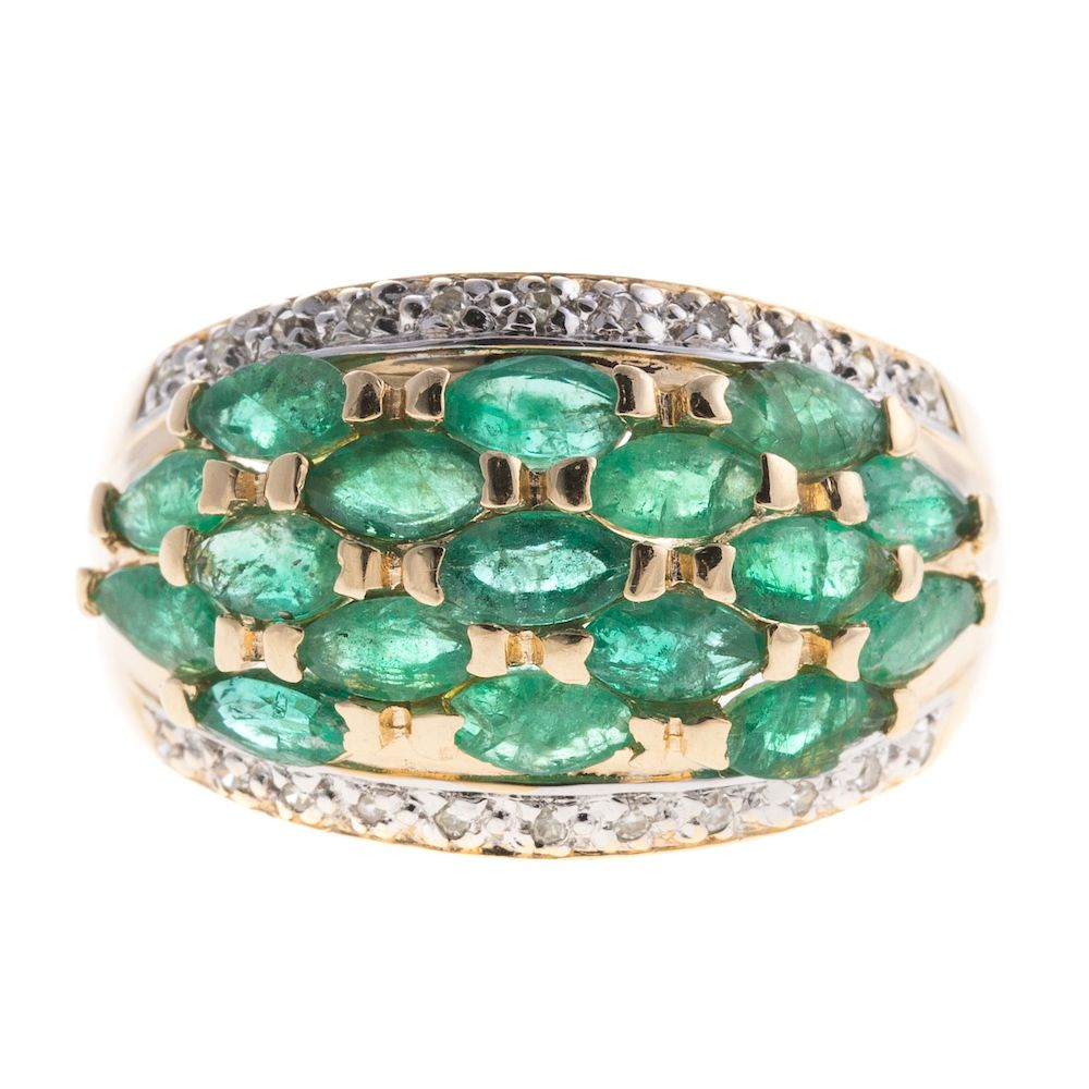 A Ladies Emerald and Diamond Wide Band in 14K 14K