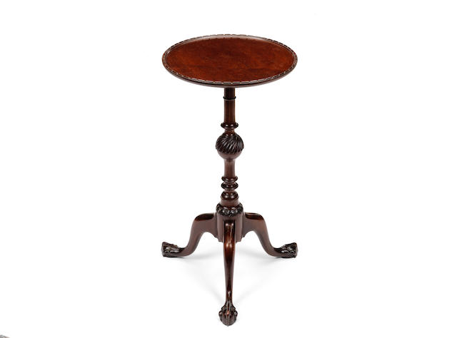 A Victorian mahogany kettle stand by Holland Sons in the