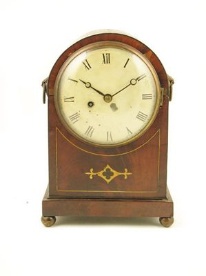A 19th century mahogany mantel clock the single fusee movement