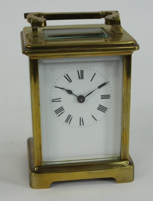 A gilt brass carriage timepiece 15cm 6 high