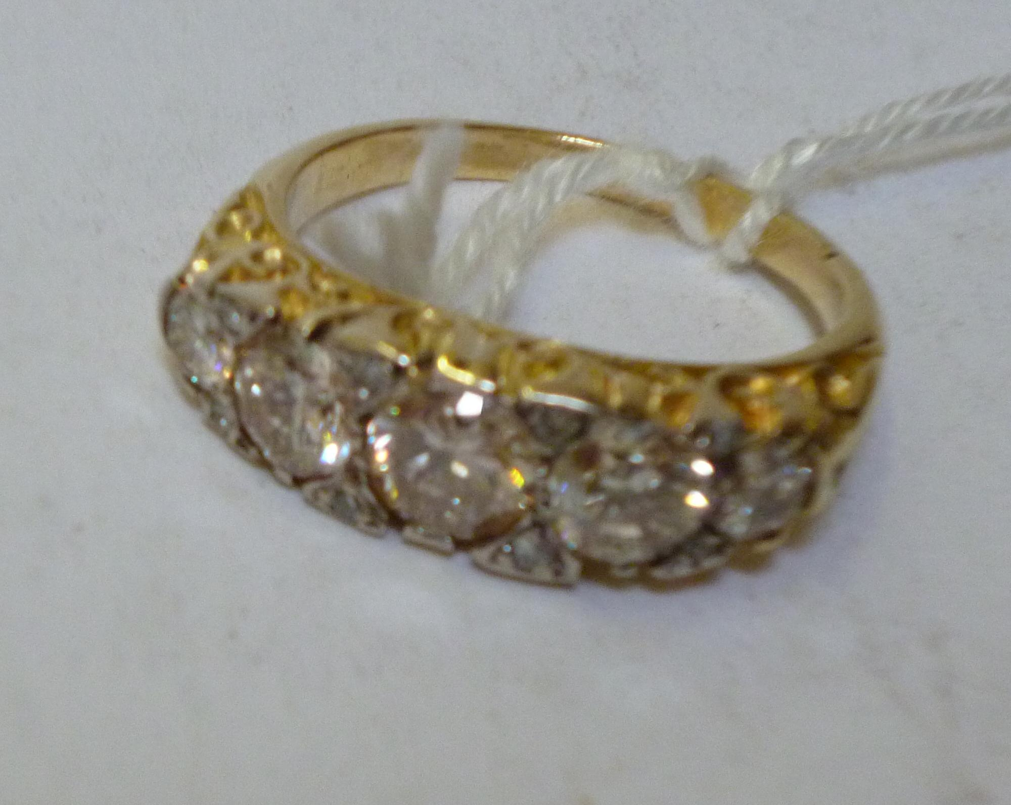 A FIVE STONE DIAMOND RING the old brilliant cut stones