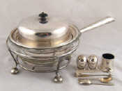 Silver plate including a muffineer two salts a glass dish